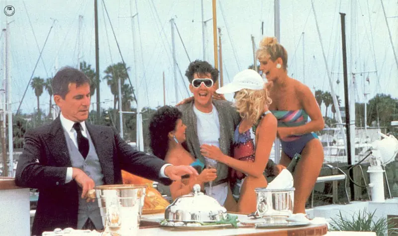 In OVERBOARD, viewers are supposed to be okay with "Annie" and Dean's blooming romance because Grant (Edward Hermann) abandoned Joanna is apparently cheating on her. The question - is that Rielle Hunter in the blue bathing suit?