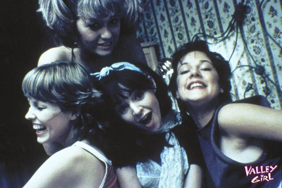 A group of women posing for the camera.