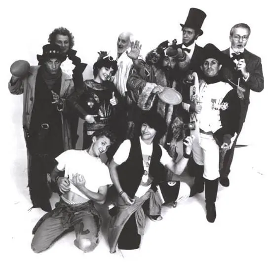 A group of people dressed in costumes and holding instruments.