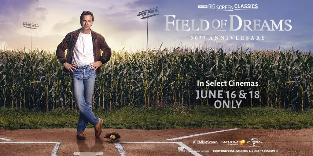 A man standing on top of a baseball field.